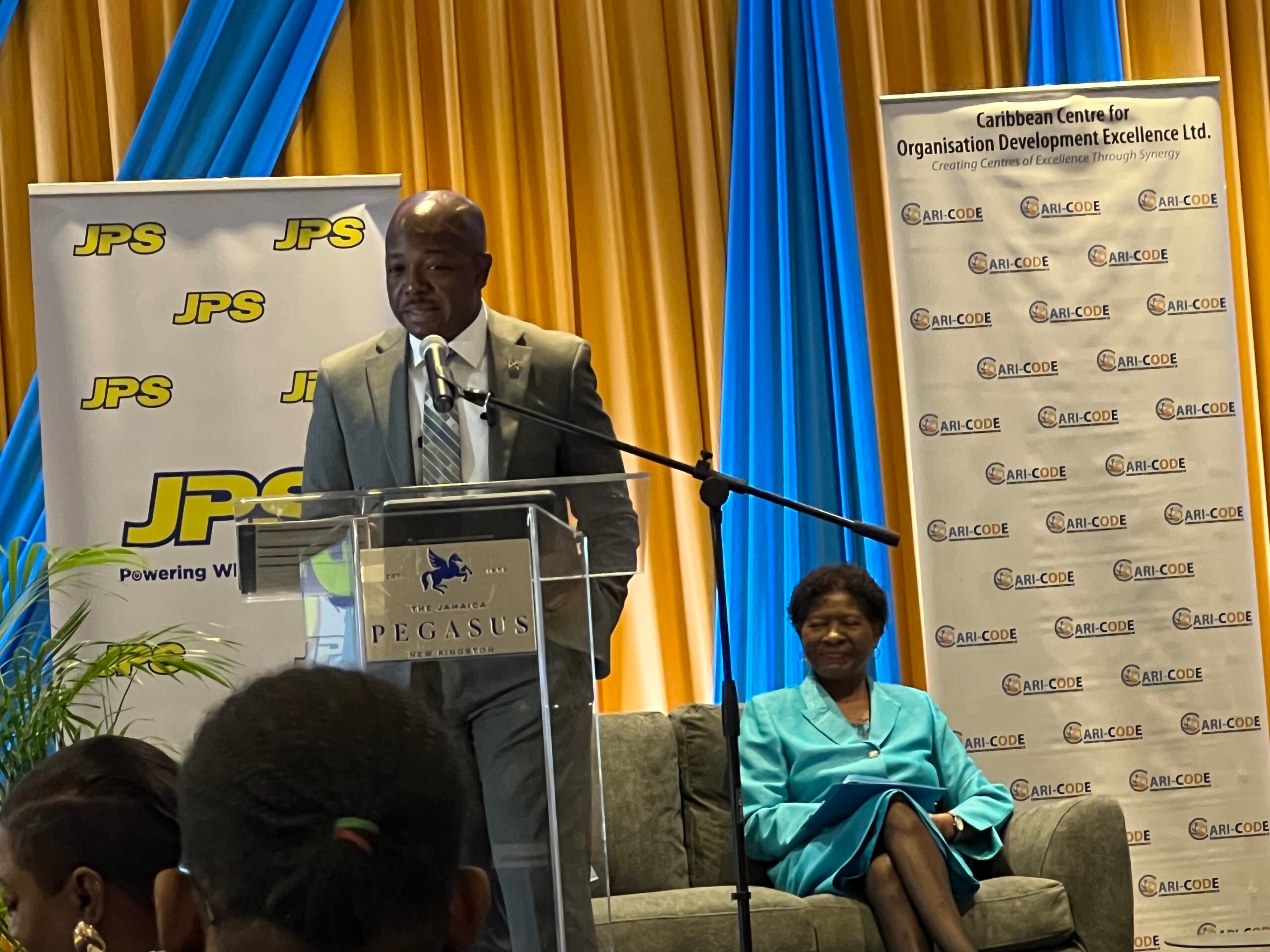 Speaker discussing artificial intelligence, emotional intelligence and education in Jamaica